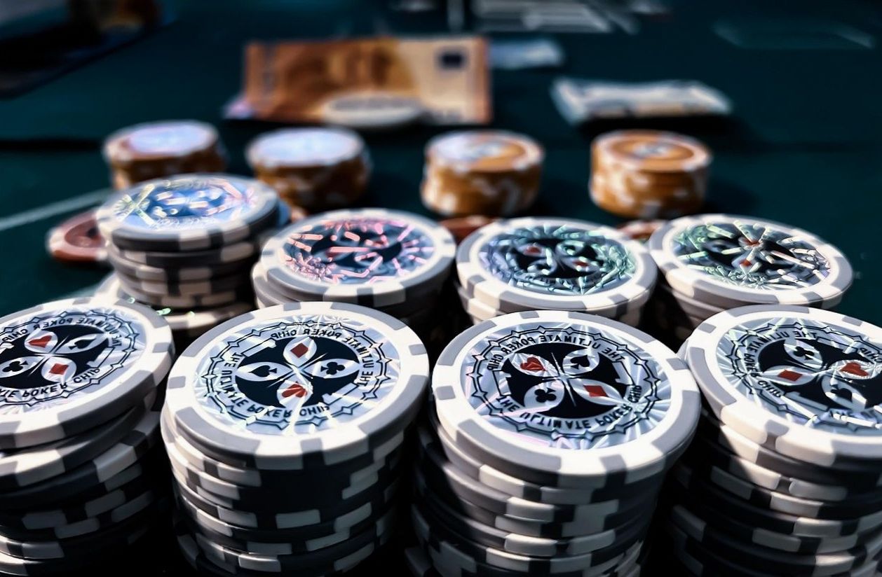 Poker chips stacked on a felt table