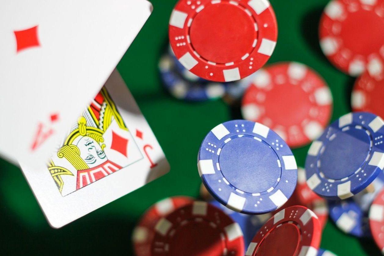 Cards and chips on green felt